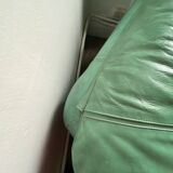 New armchair in vintage green leather