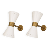 Pair of wall sconces in the style of the 1950s.