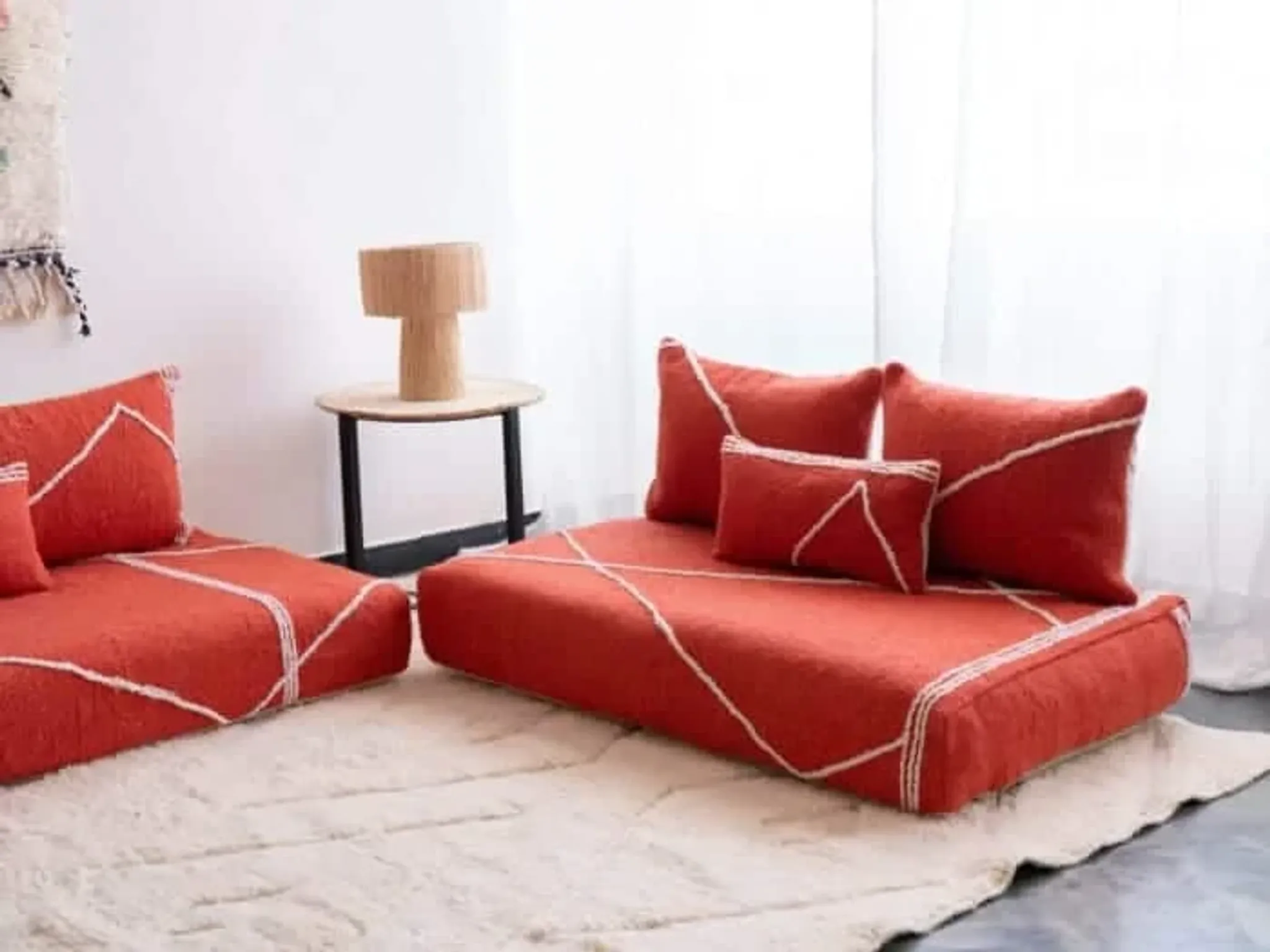 Handmade Moroccan floor cushion in orange cotton.