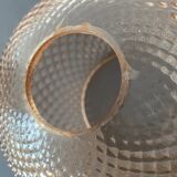 Spherical glass globe with pins. Salmon pink color