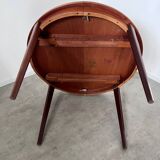 Round teak table with Scandinavian design extensions from the 60s vintage