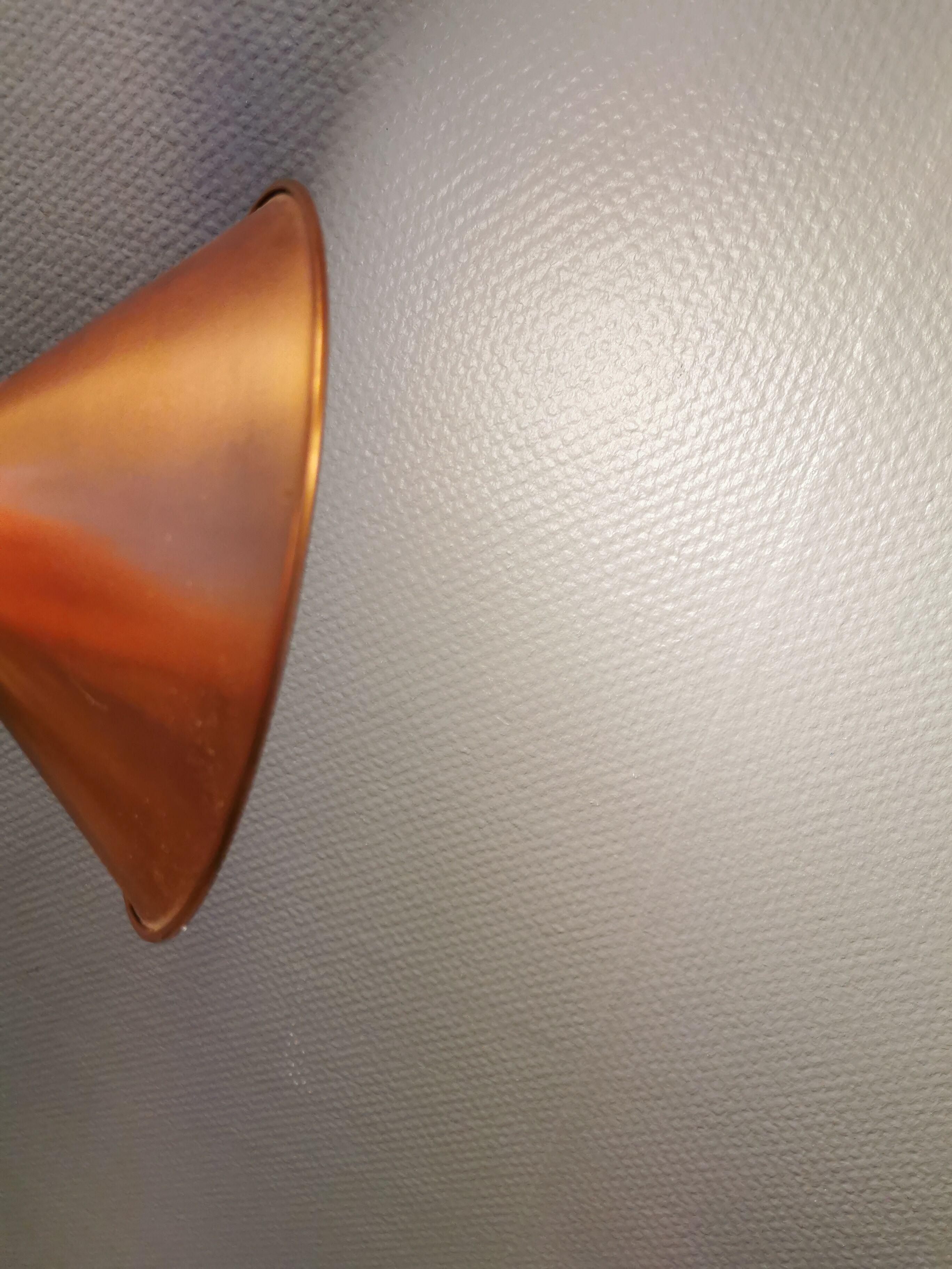 Copper hanging lamp with brass colored top and white inside lacquer.
