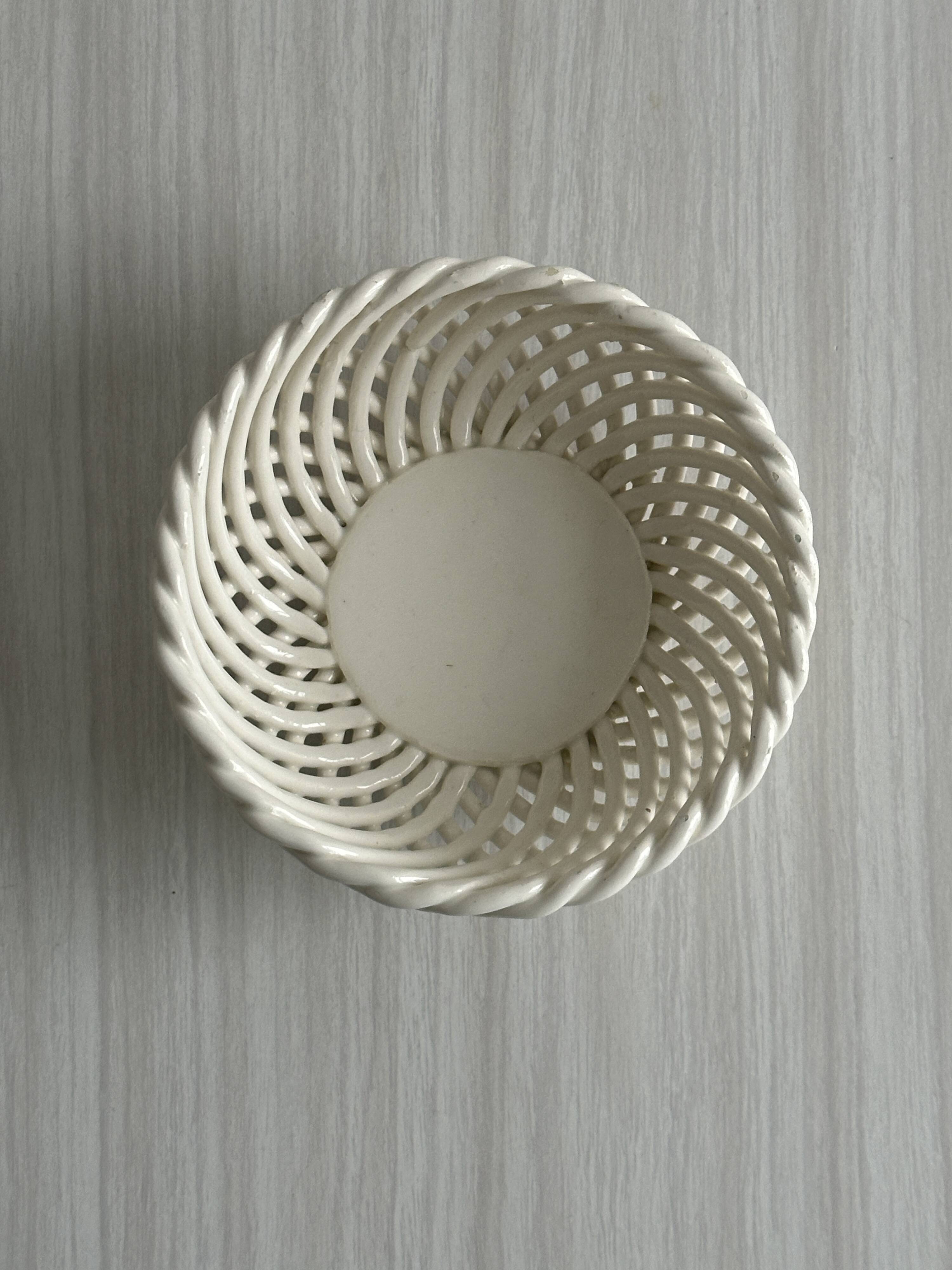 white openwork ceramic cup