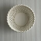 white openwork ceramic cup