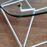 Glass coffee table with steel legs