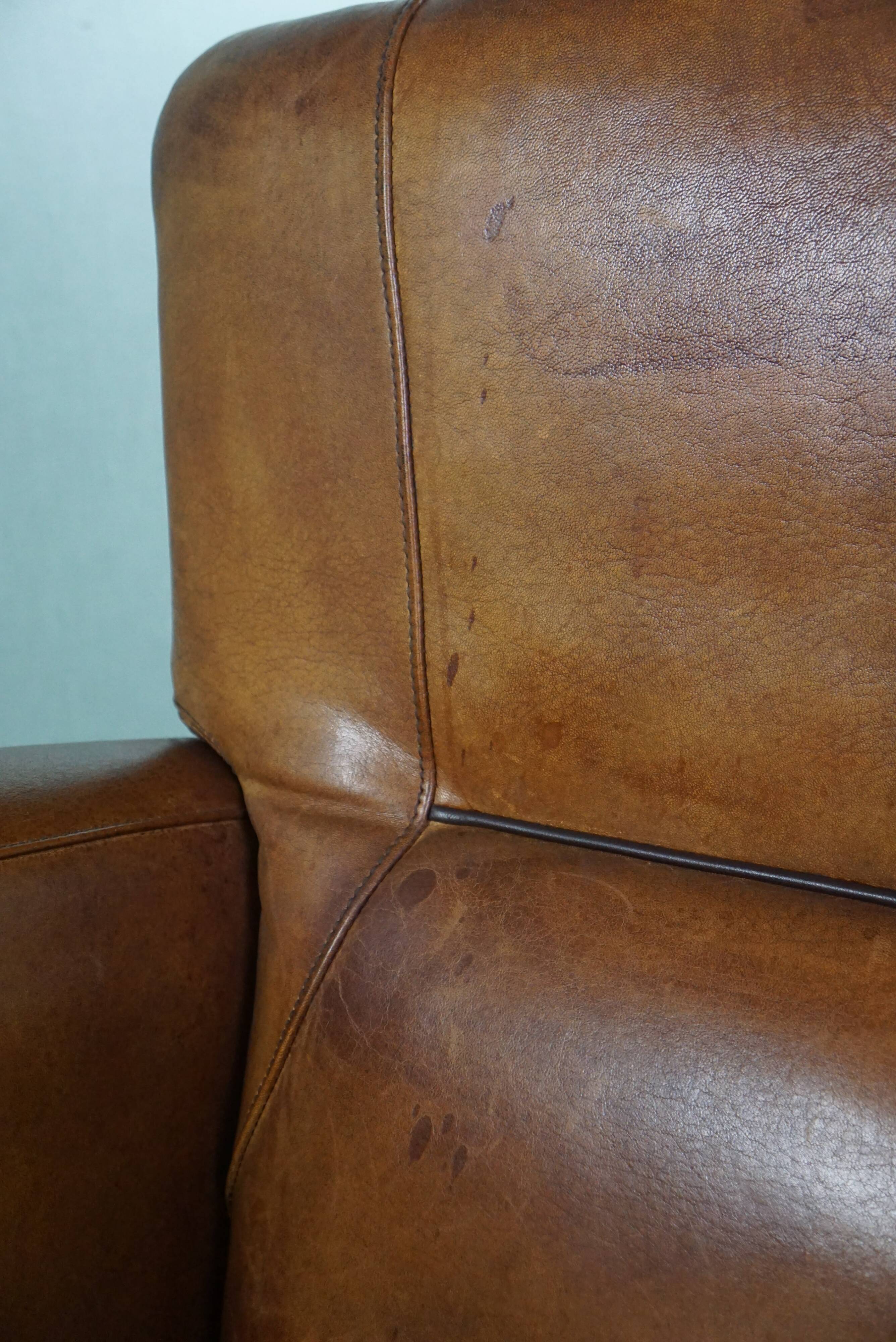 Striking modern design armchair made of high-quality sheepskin leather