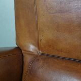 Striking modern design armchair made of high-quality sheepskin leather