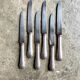 6 silver metal knives
