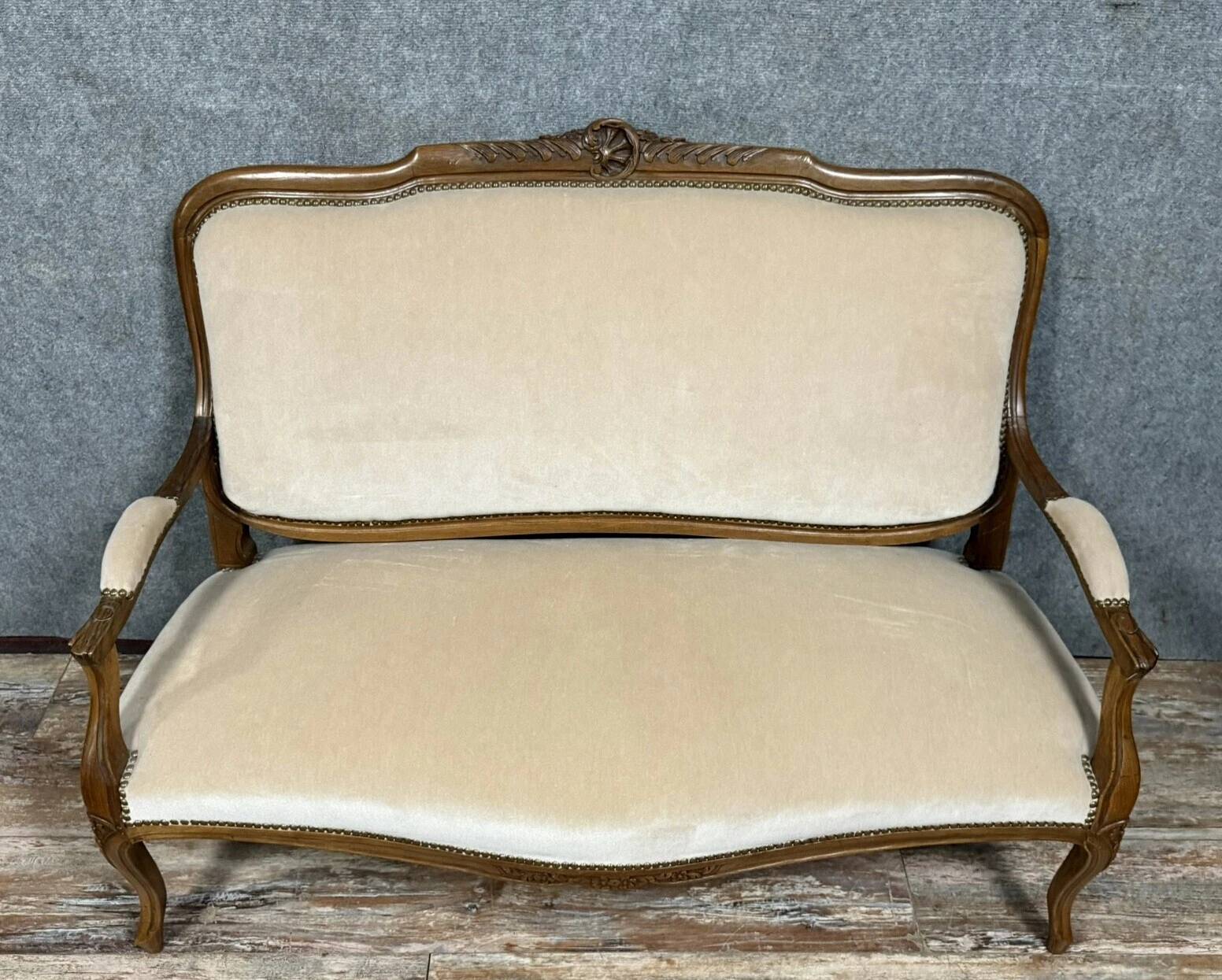 Louis XV style bench in molded and carved wood circa 1900