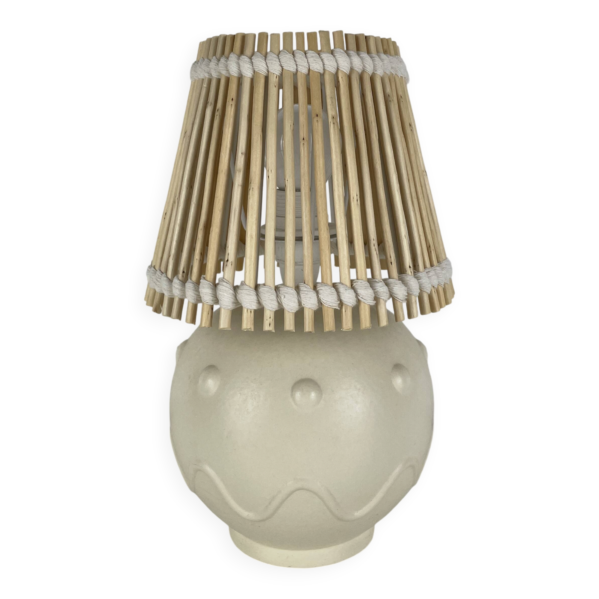 Vintage ceramic lamp with wicker and cotton shade.