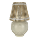 Vintage ceramic lamp with wicker and cotton shade.