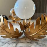 Pair of palm leaf wall lights in Hollywood Regency style with opaque globes by Hans Kögl, Germany, 1970s.