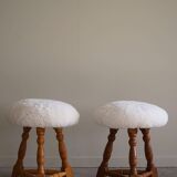 Modern Danish, a pair of tripod stools, seats reupholstered in lambswool, 1950s.