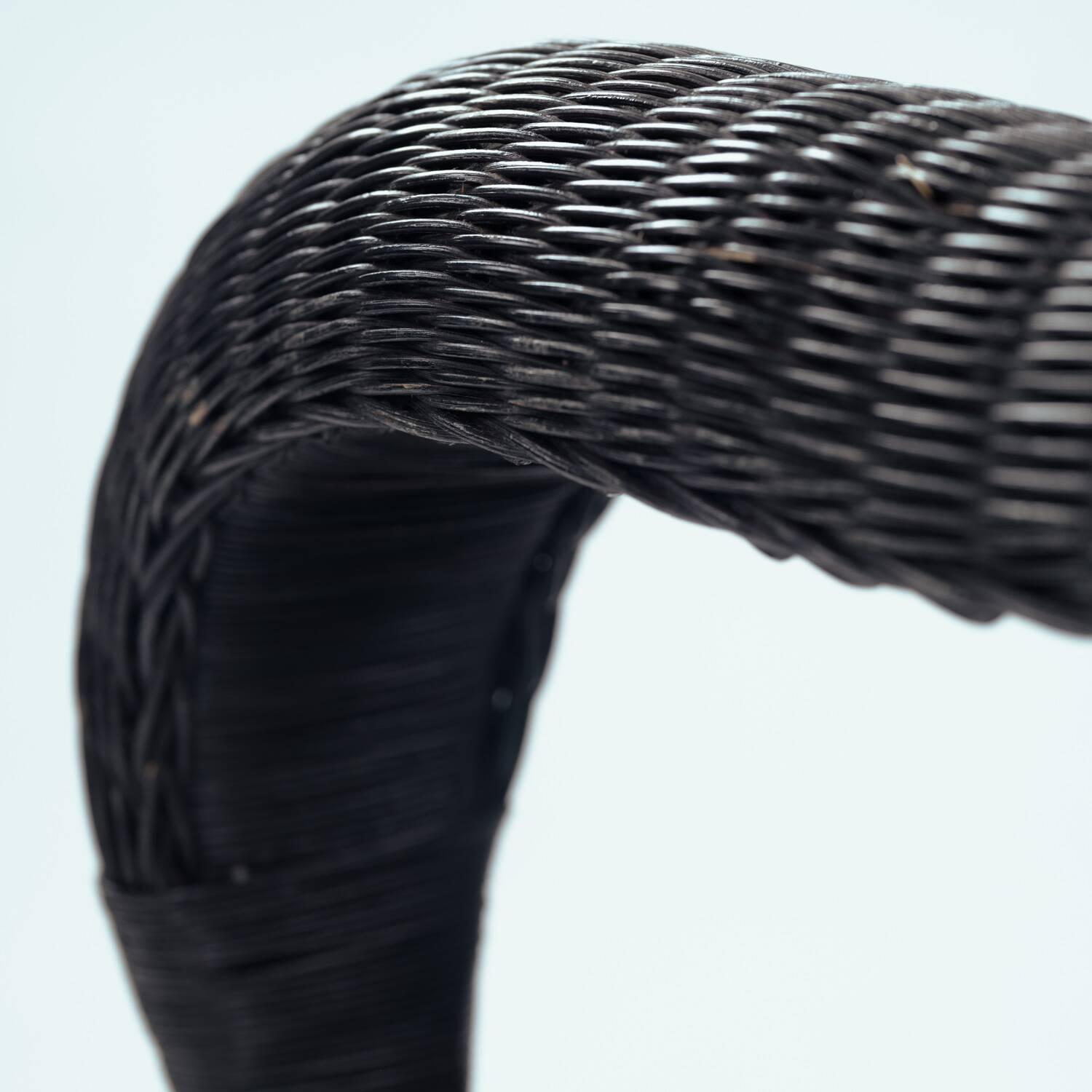 Sculptural rattan tripod armchairs in the manner of Boris Sipek