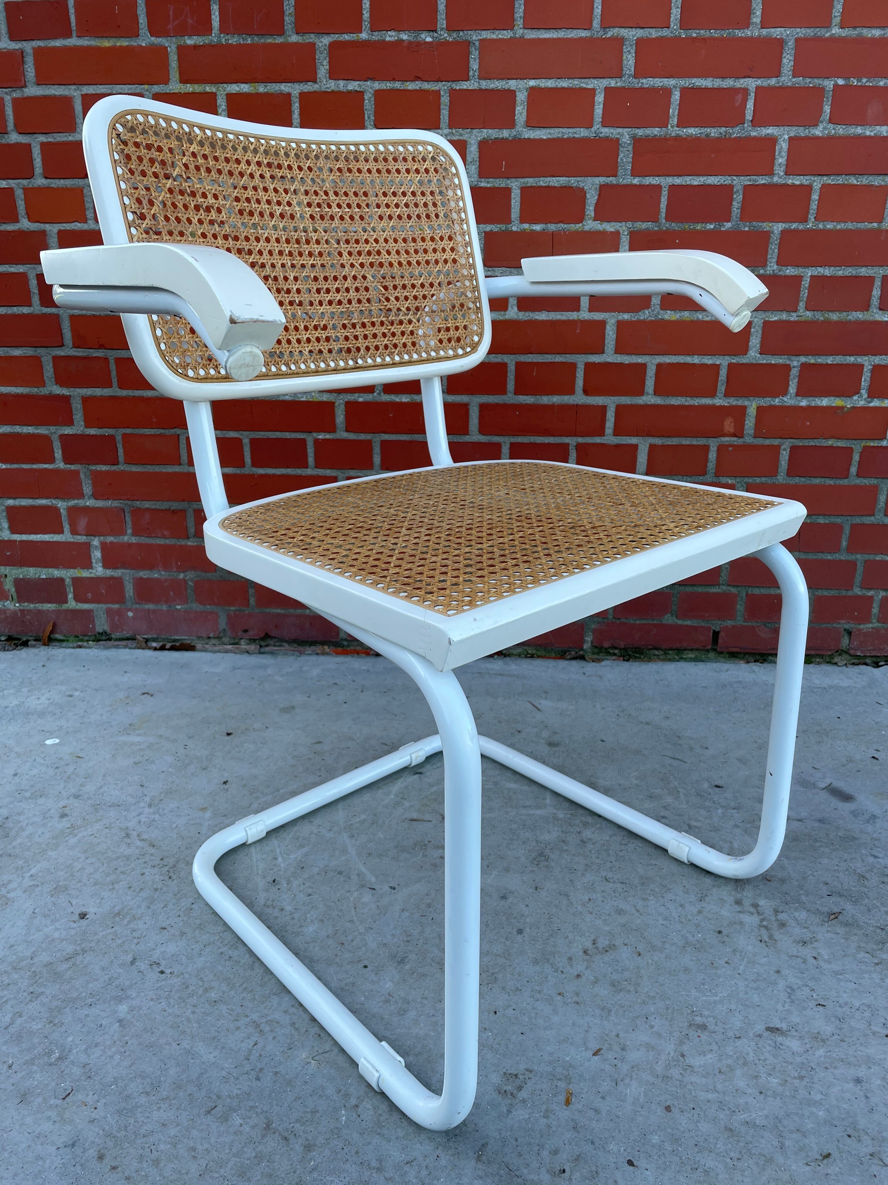Cesca Chair model with armrest in white