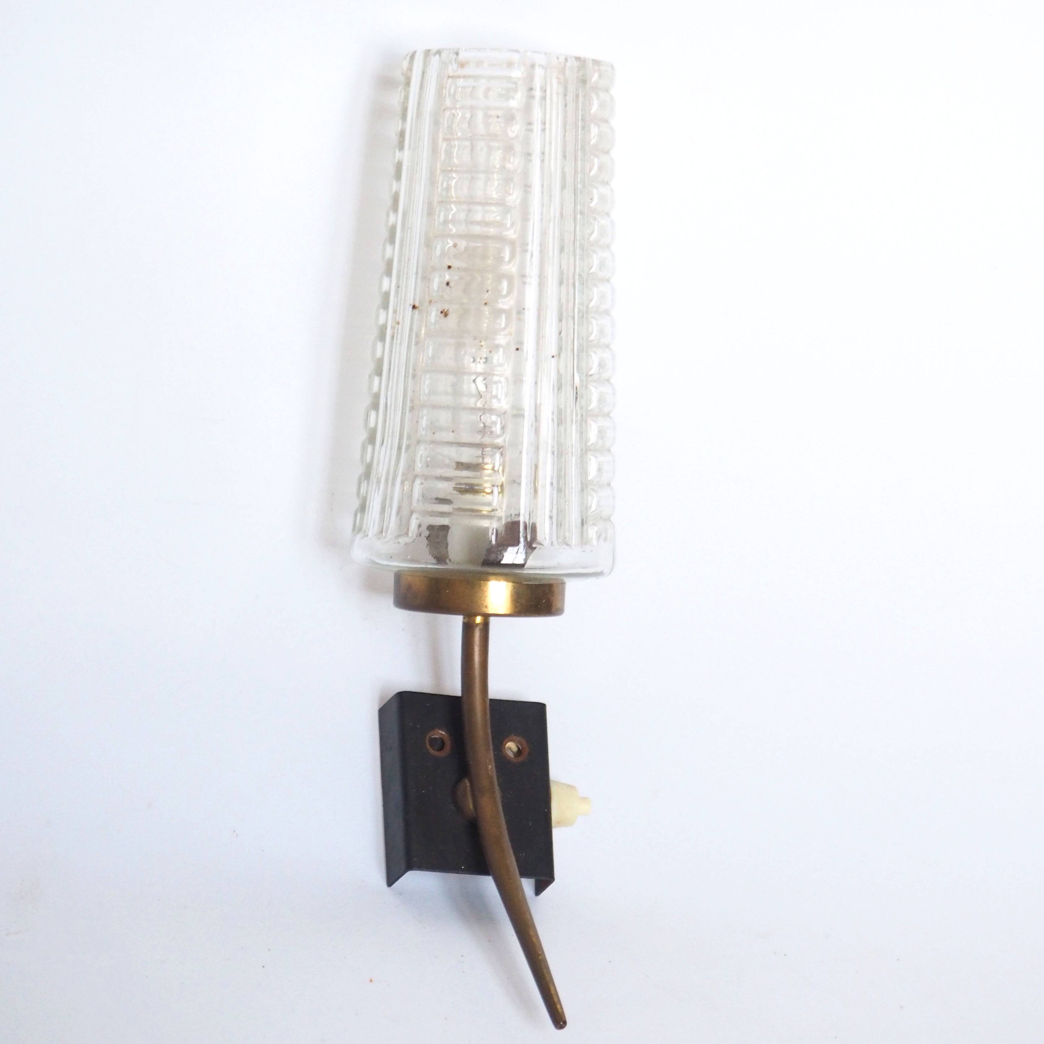 Glass and brass wall light