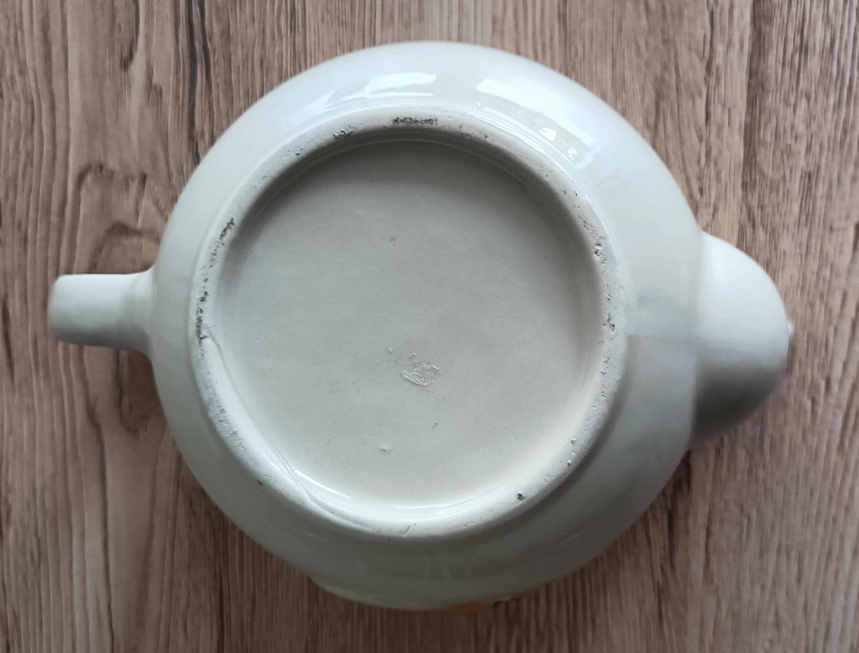 Slush teapot with embossed fruit decoration