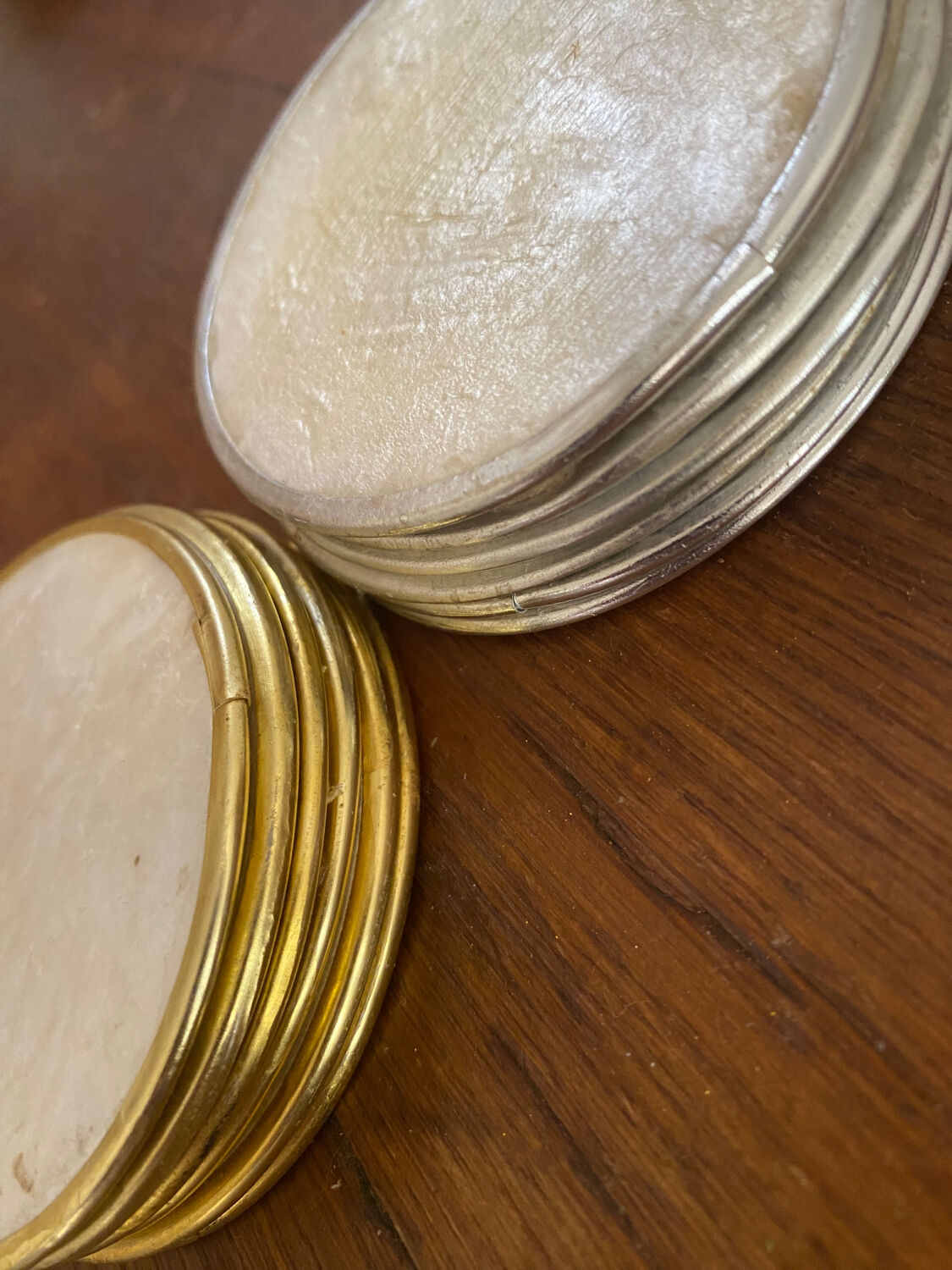 Set of 12 coasters in mother-of-pearl and gilded metal