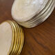 Set of 12 coasters in mother-of-pearl and gilded metal