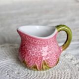 Vintage milk jug in Italian faience majolica.