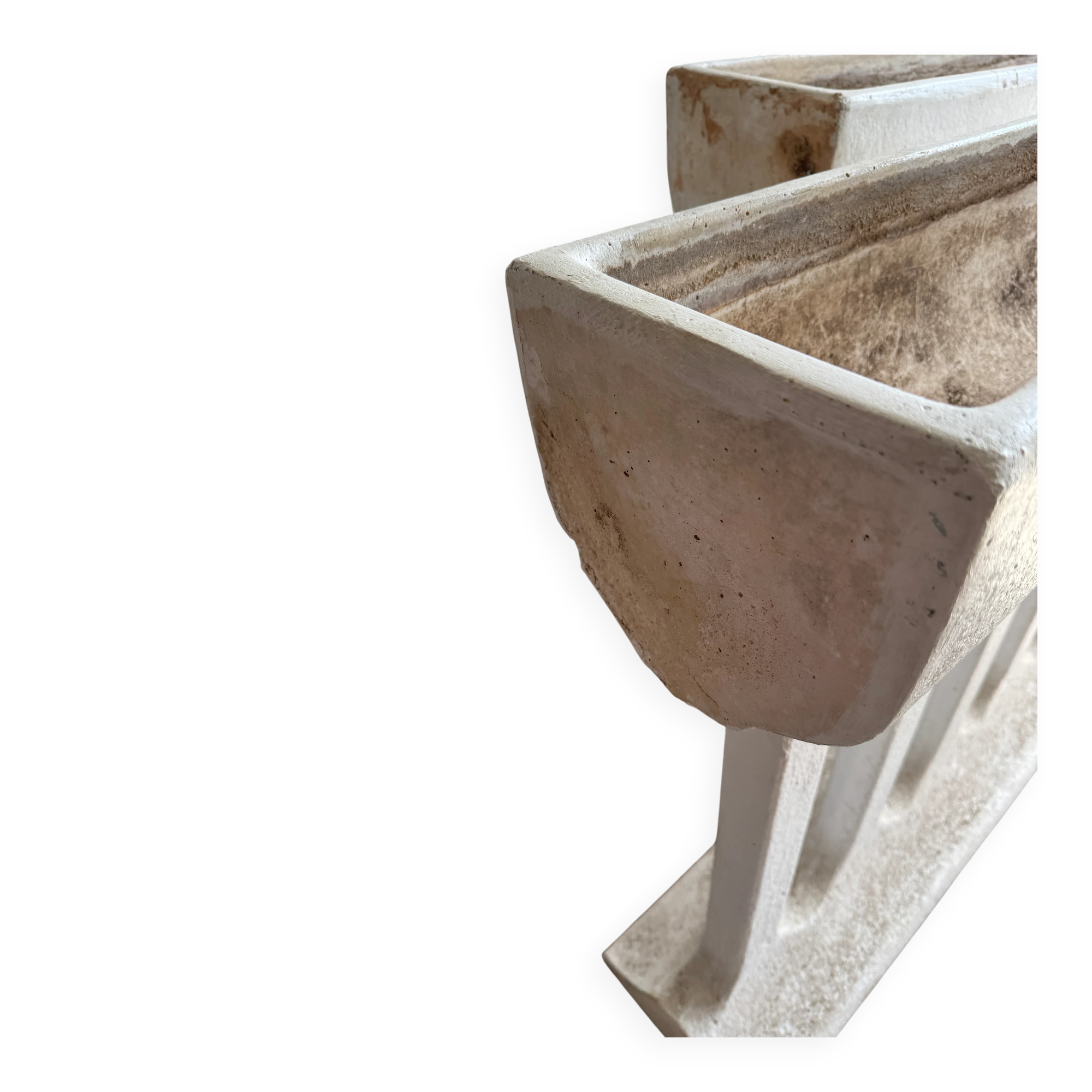 Pair of sculptural cast concrete planters in Off-White, mid-century brutalist style, long and rectangular.