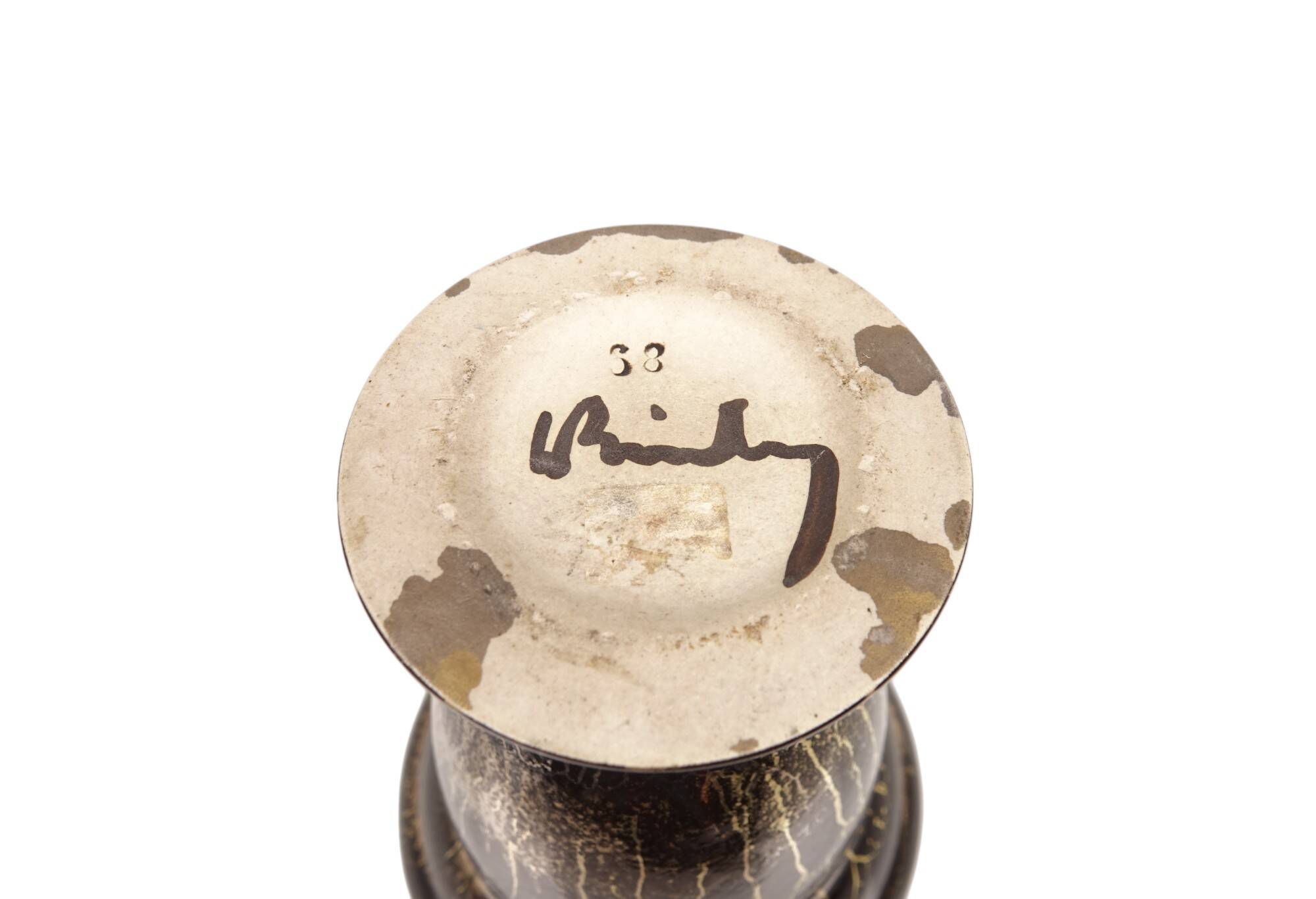 Lucien BRISDOUX Vase or bowl in black ceramic and gold oil