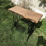 Cast iron and solid wood side table