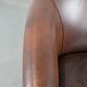 Cognac-coloured cow leather club armchair in English style