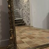 Large gilded mirror with pediment