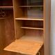 Rattan wardrobe with tapered legs from the 1960s.