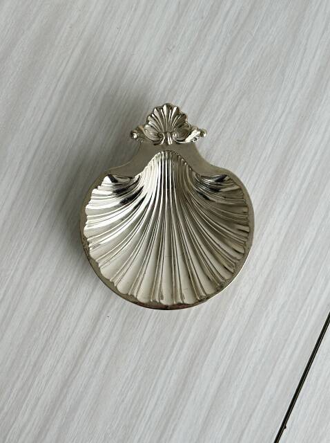 Metal shell catchall