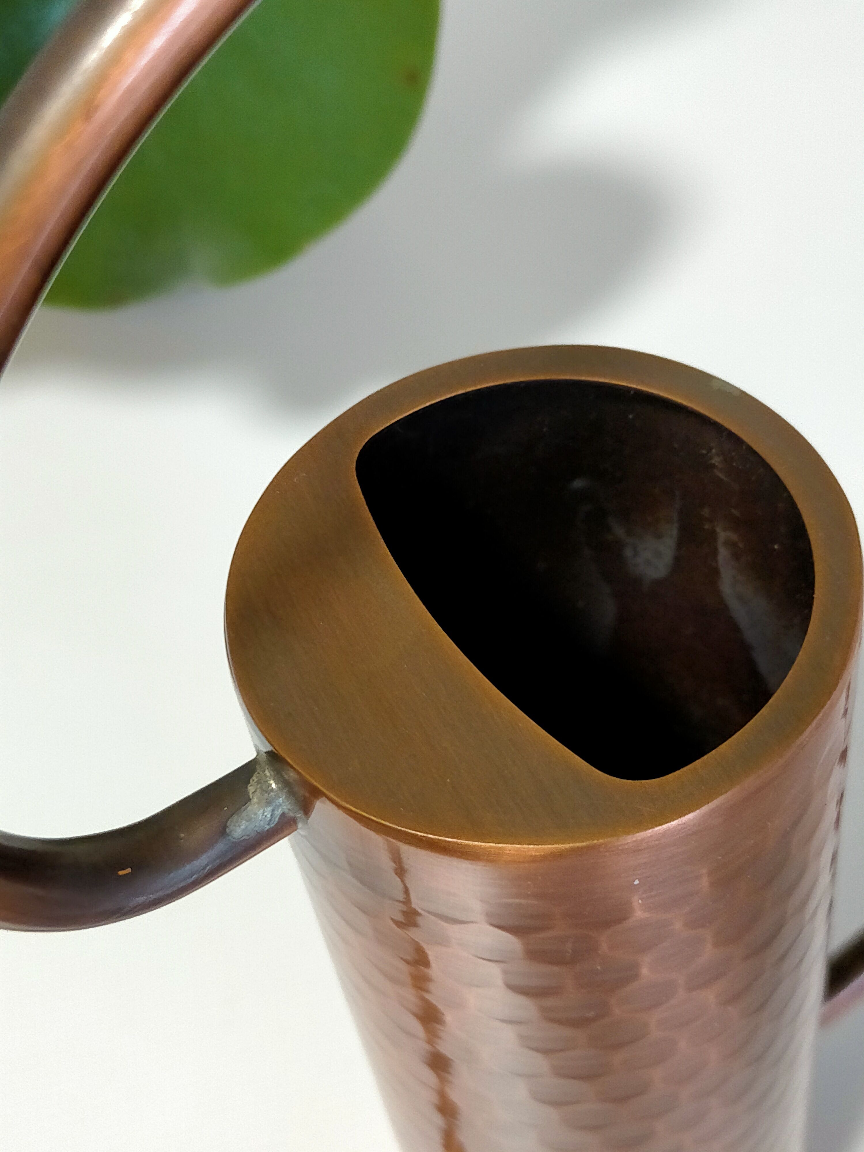 Hammered copper watering can