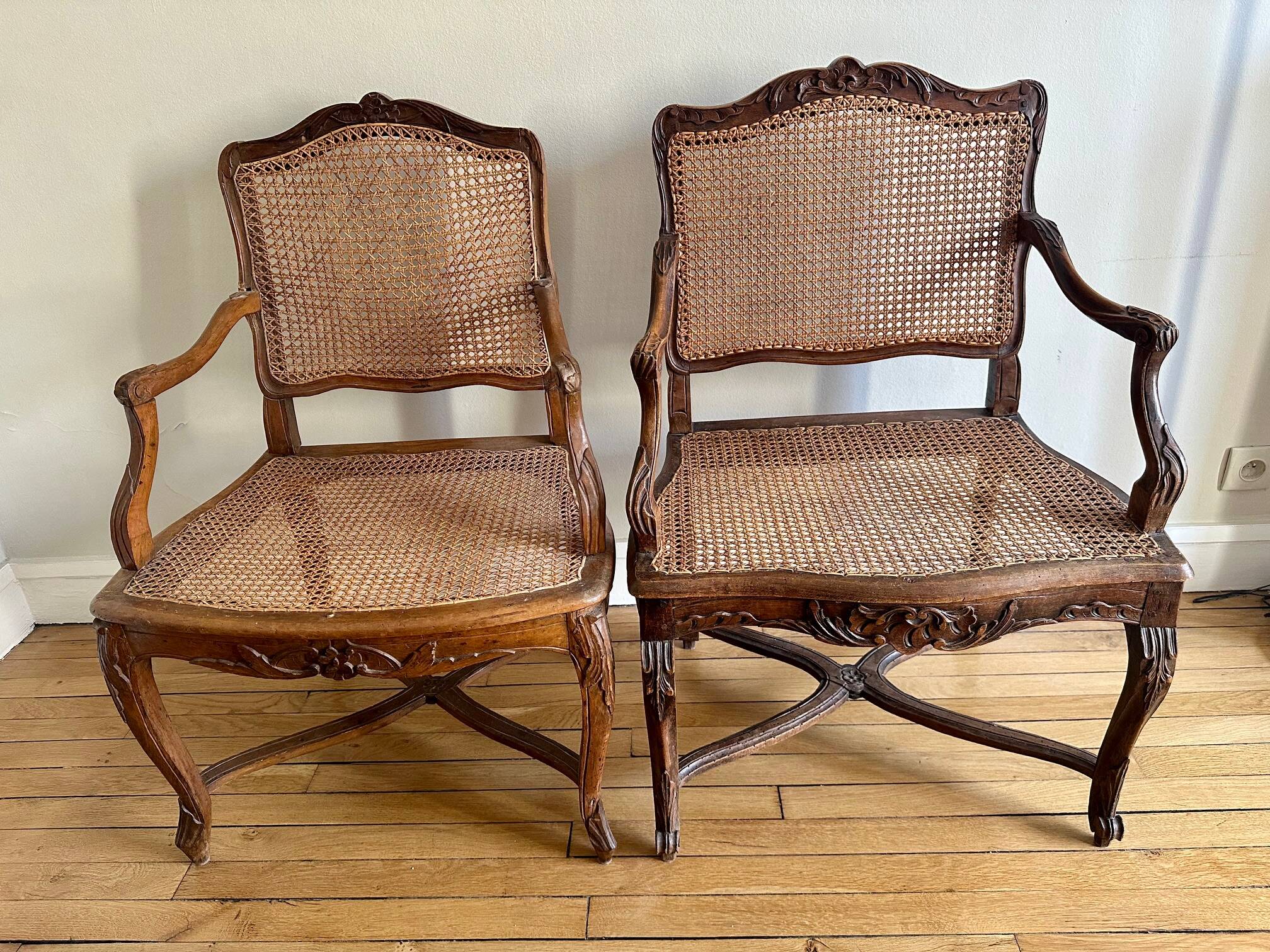 A pair of Regency armchairs with a stretcher.