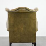Moss green cow leather Chesterfield wingback armchair in English style