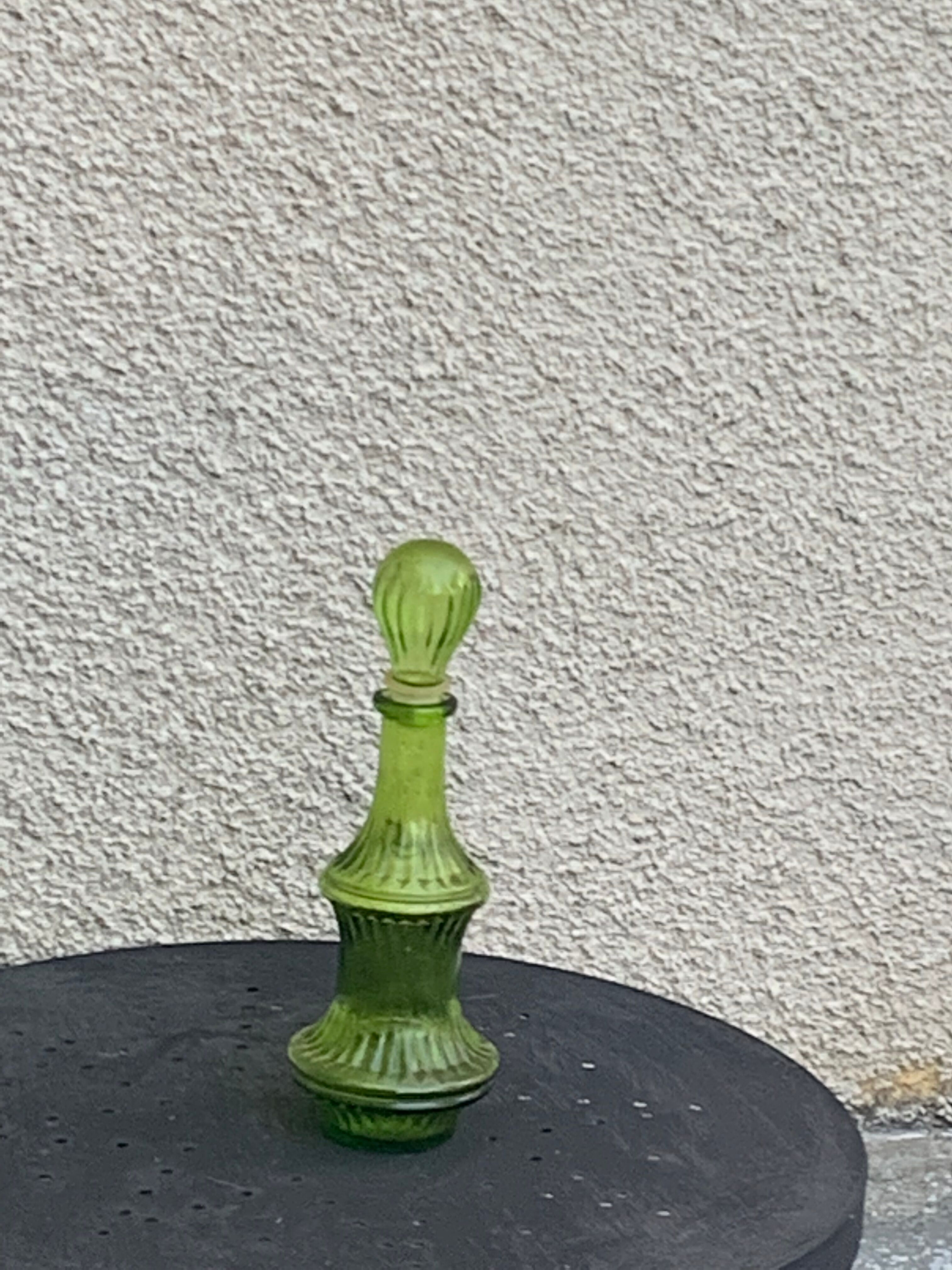 Vintage green glass decanter