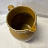 Old yellow sandstone pitcher