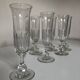 Set of 9 Louis Philippe tulip champagne flutes with flat sides mid 19th