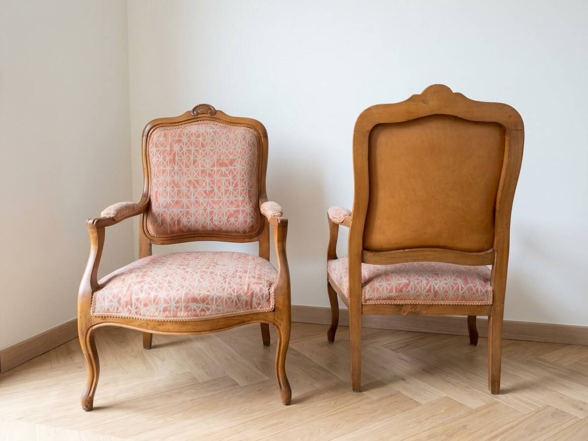 Pair of cabriolet armchairs in Louis XV style in light walnut.