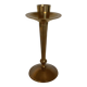 Asymmetrical brass candle holder