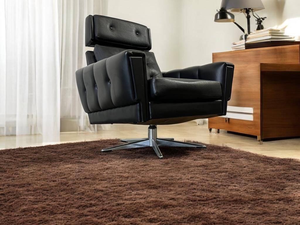 Vintage black armchair / chaise longue with star base