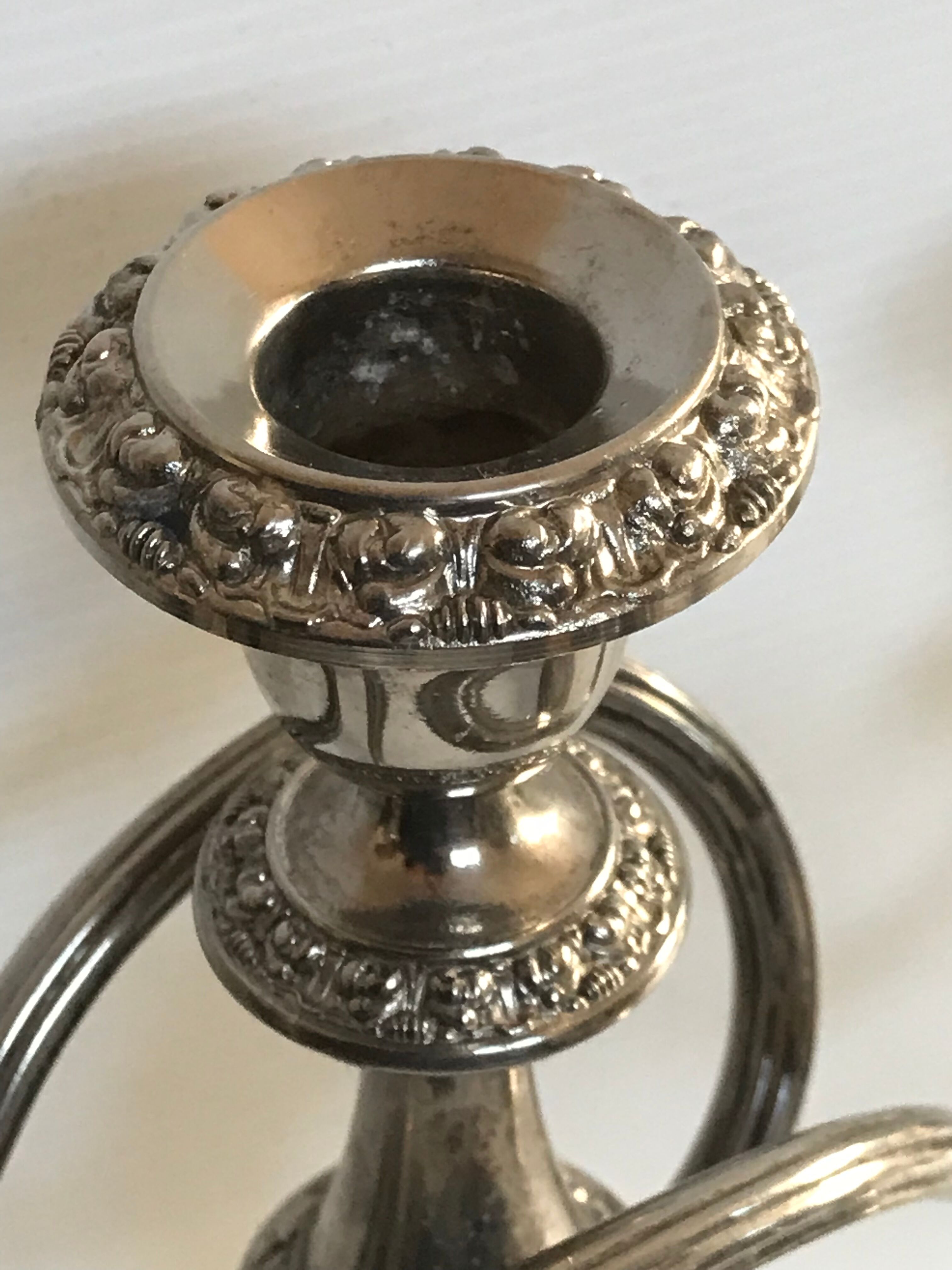 Pair of silver metal chandeliers