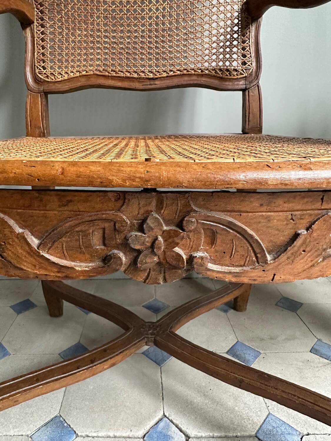 Regency armchair with stretcher