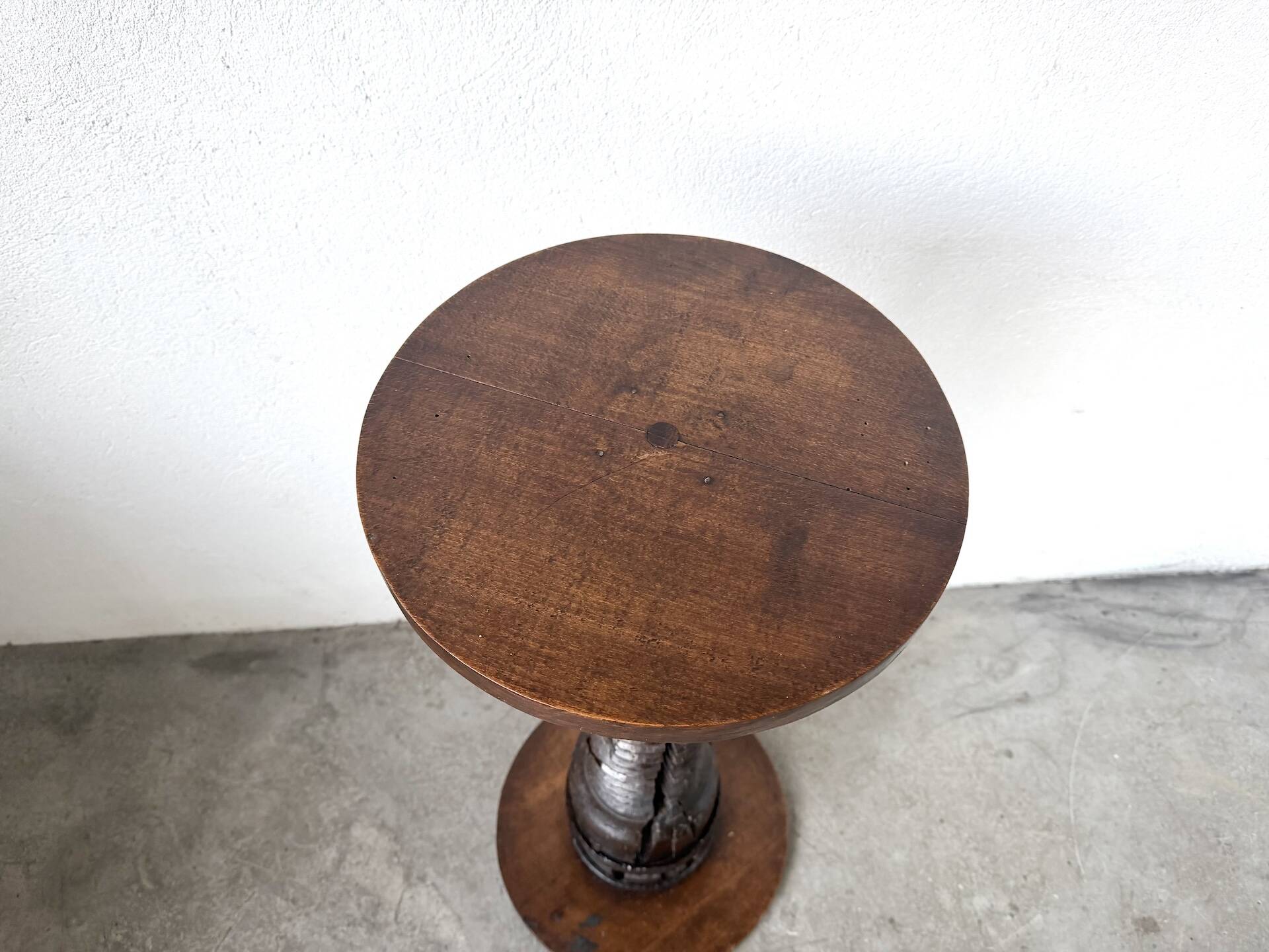 Solid oak press stool, metal base, 19th century.