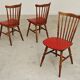 Lot de 3 chaises bois et skaï rougeTacoma par Baumann 1960