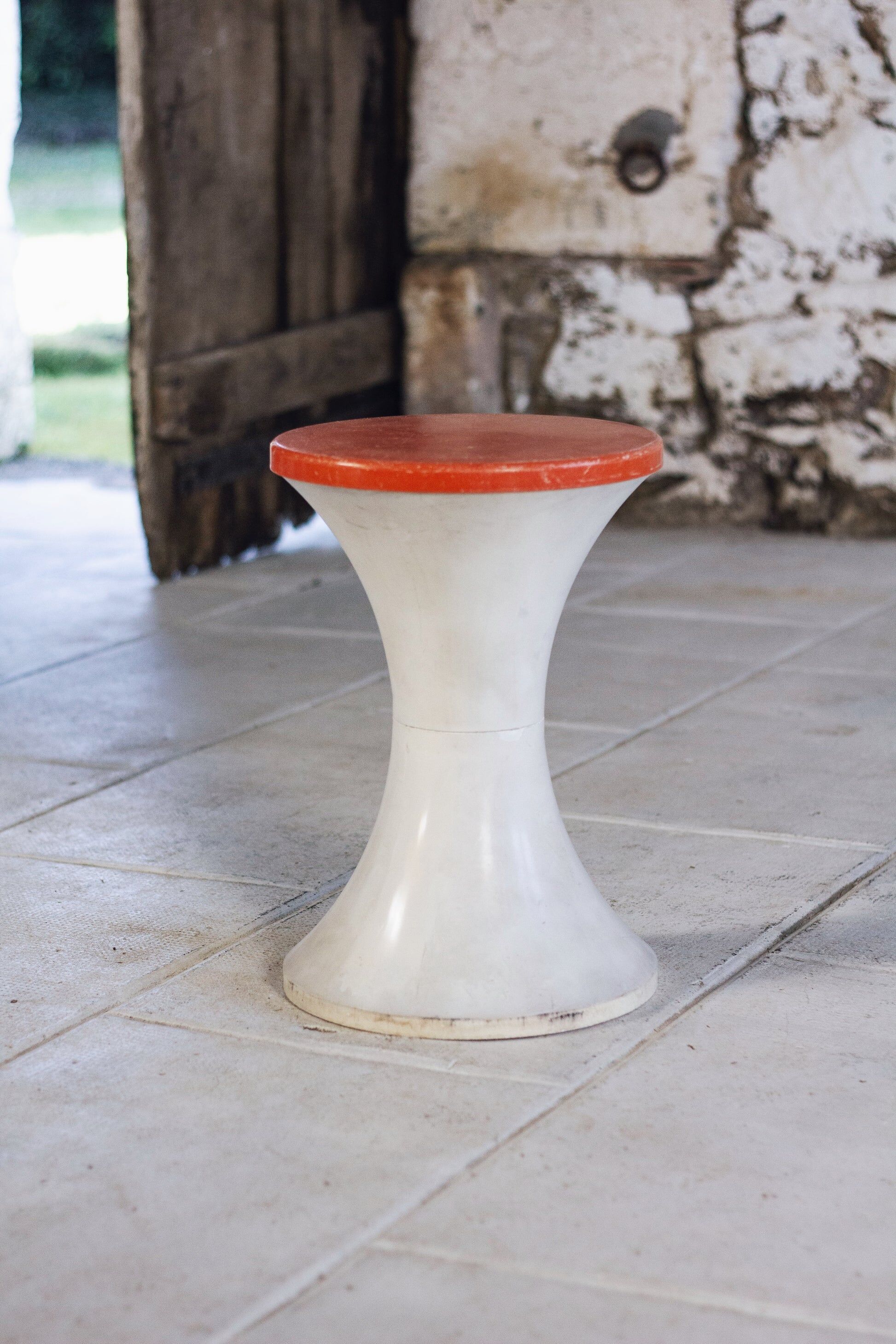 White and dark orange Tam Tam stool by Henry Massonnet for Stamp, 1970.