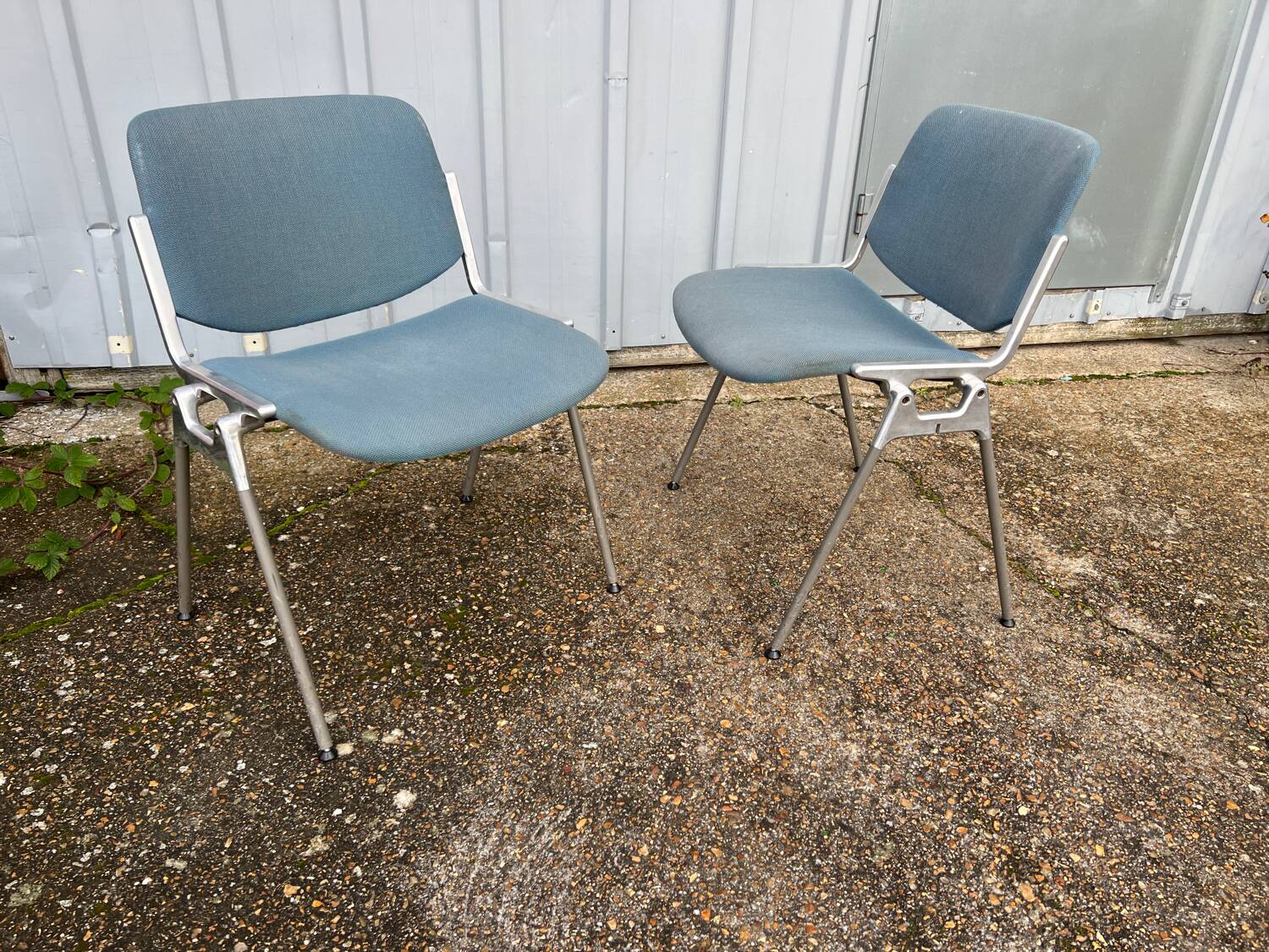 Pair of chairs by G. Piretti for Castelli