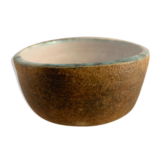 Round ashtray signed in sandstone with glazed interior