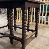 Wooden table with gateleg flaps