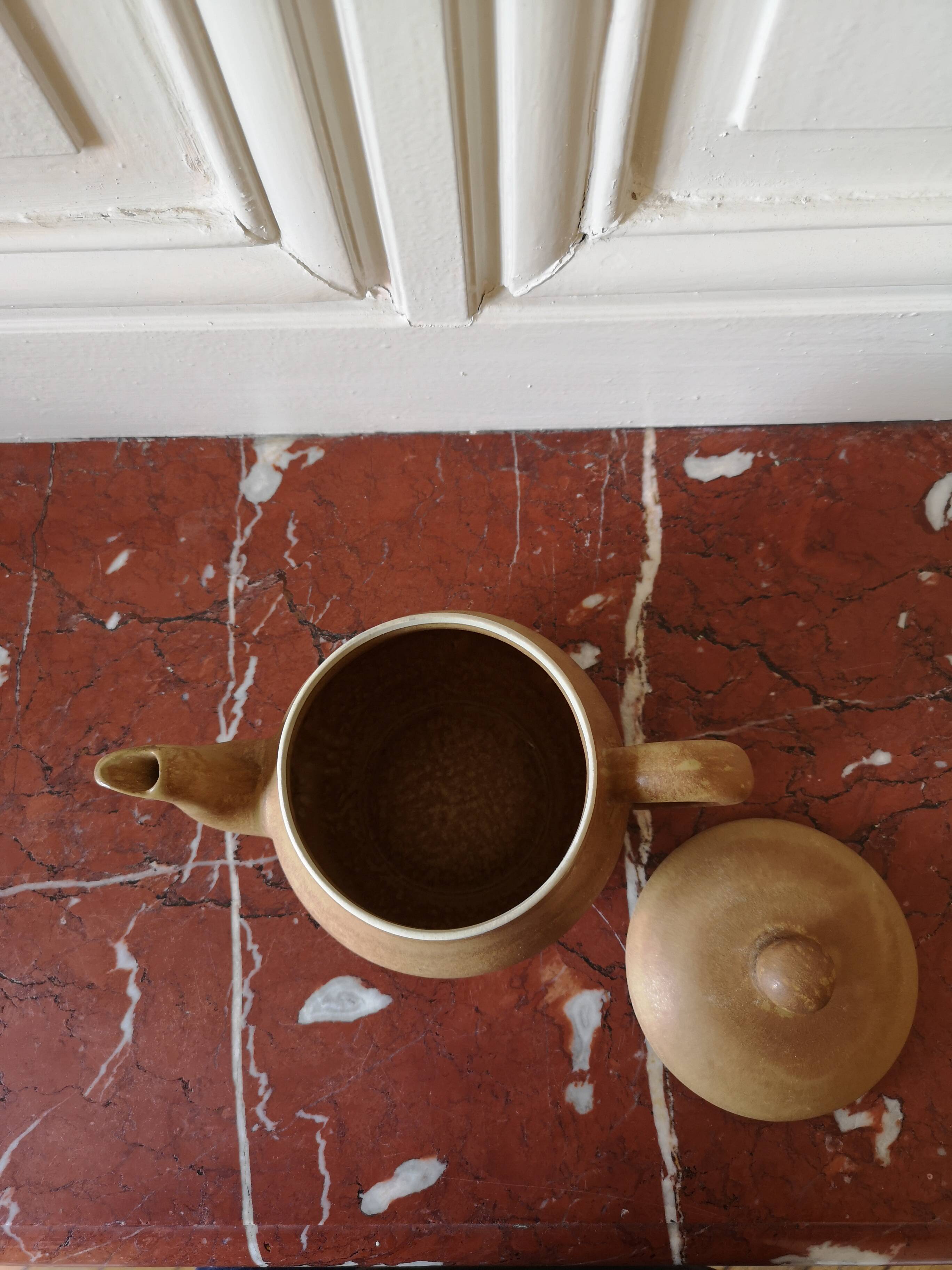 Vintage stoneware teapot and cup, "selfish" tea service, signed