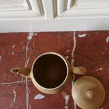 Vintage stoneware teapot and cup, "selfish" tea service, signed